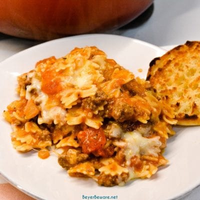 Easy Skillet lasagna is a quick one pan lasagna recipe made with ground beef and pasta with plenty of cheese and tomato sauce in less than 30 minutes to fill up your hungry family.