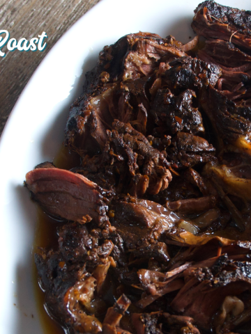 Crock Pot balsamic beef roast recipe combines balsamic vinegar with honey and red peppers over a beef roast for a tender and juicy slow cooker beef roast.