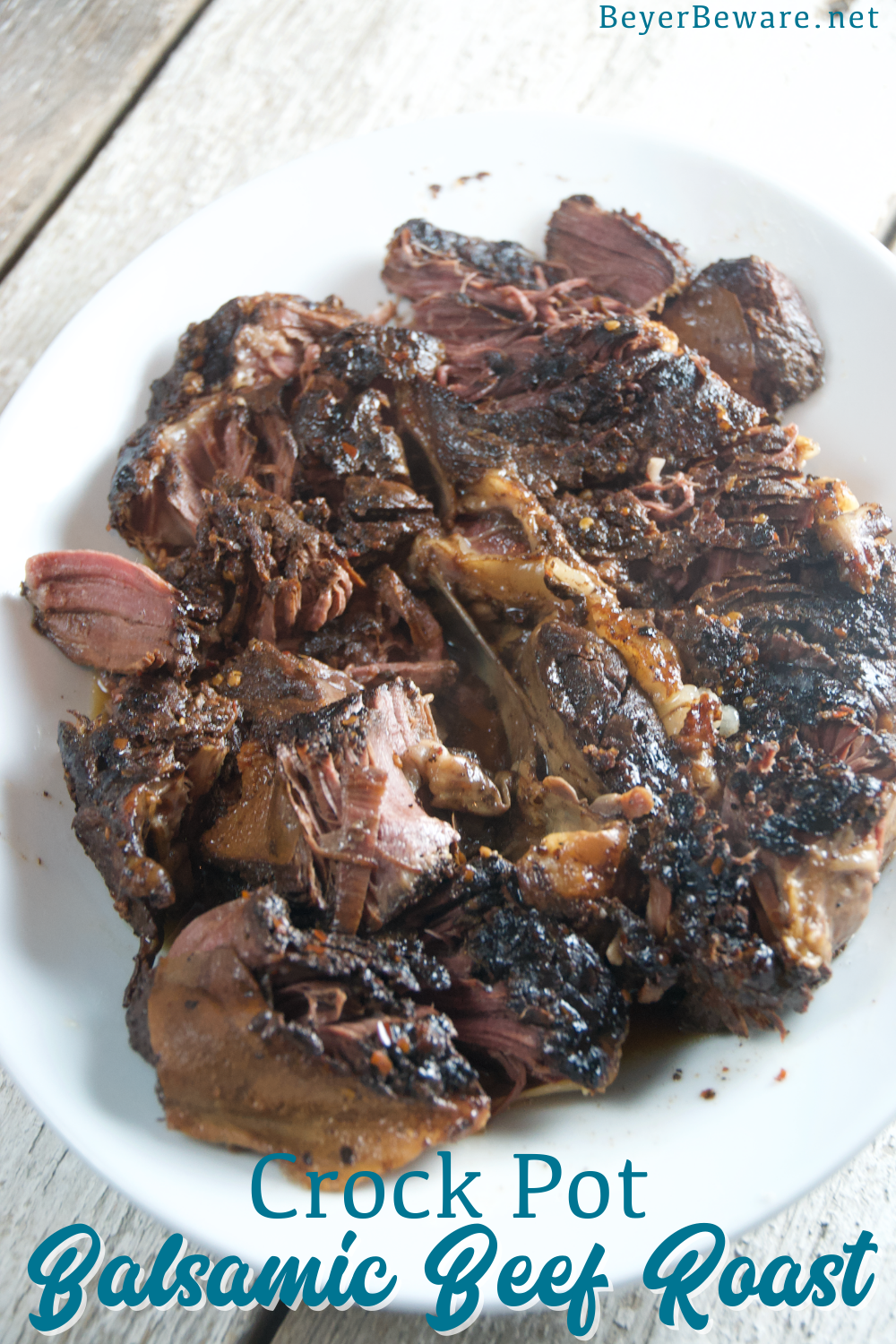 Crock Pot balsamic beef roast recipe combines balsamic vinegar with honey and red peppers over a beef roast for a tender and juicy slow cooker beef roast.