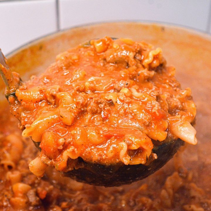 Lasagna soup recipe with ricotta is made with ground pork or beef, Italian seasonings, your favorite pasta, and topped with cheese.