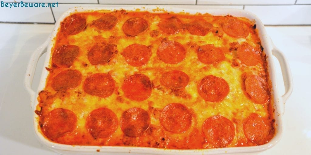 Bubble-Up pizza casserole is an easy weeknight meal since the casserole is made with grands biscuits, spaghetti sauce and your favorite pizza toppings.