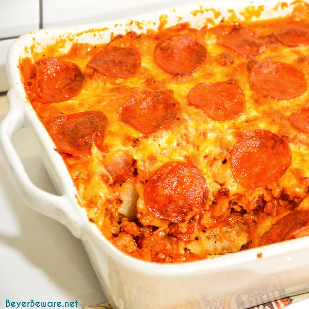 Bubble-Up pizza casserole is an easy weeknight meal since the casserole is made with Grands biscuits, spaghetti sauce, and your favorite pizza toppings. 