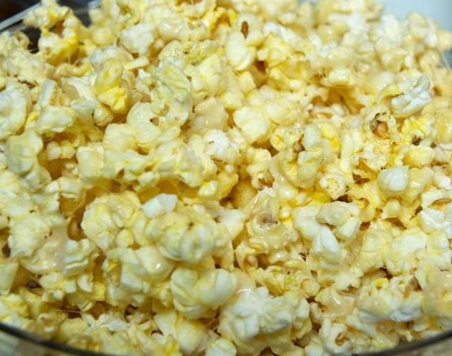 Ooey-gooey popcorn entails marshmallow sweetness poured over buttery popcorn for the perfect sweet and salty treat.
