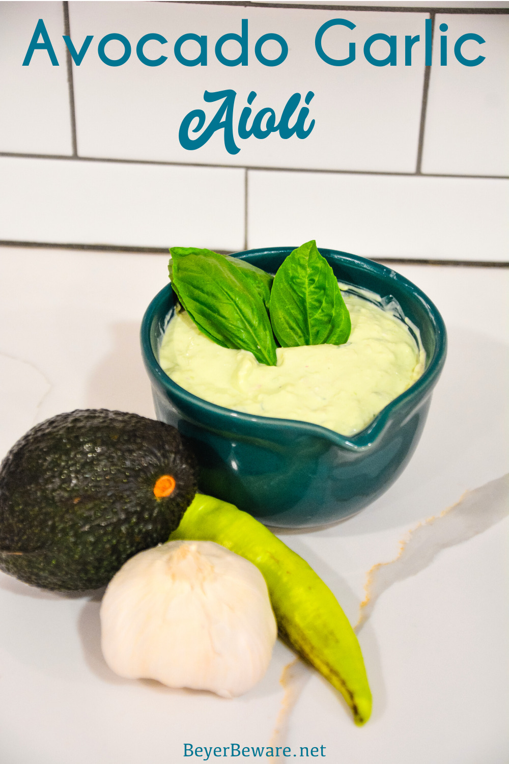 Avocado garlic aioli is a simple aioli made in the food processor with avocado, basil, mayonnaise, garlic, shallots, and lemon juice.