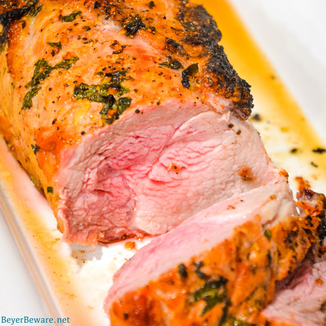 Garlic and Herb Crusted Grilled Pork Loin uses fresh herbs, garlic, and onions with simple wine, lemon juice, and oil marinade then grilled to juicy pork loin perfection. 