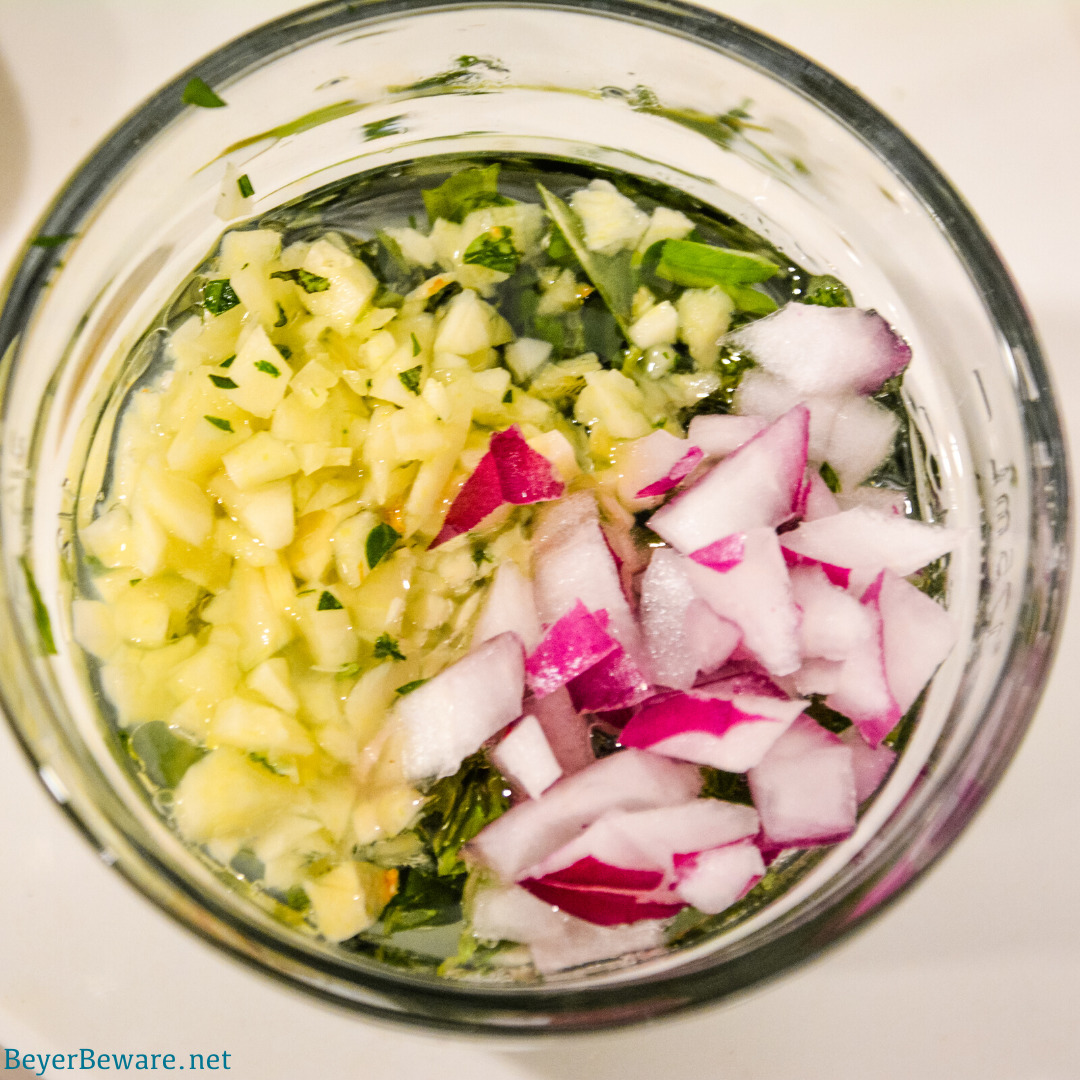 Herbs, garlic, and onions with olive oil and lemon juice