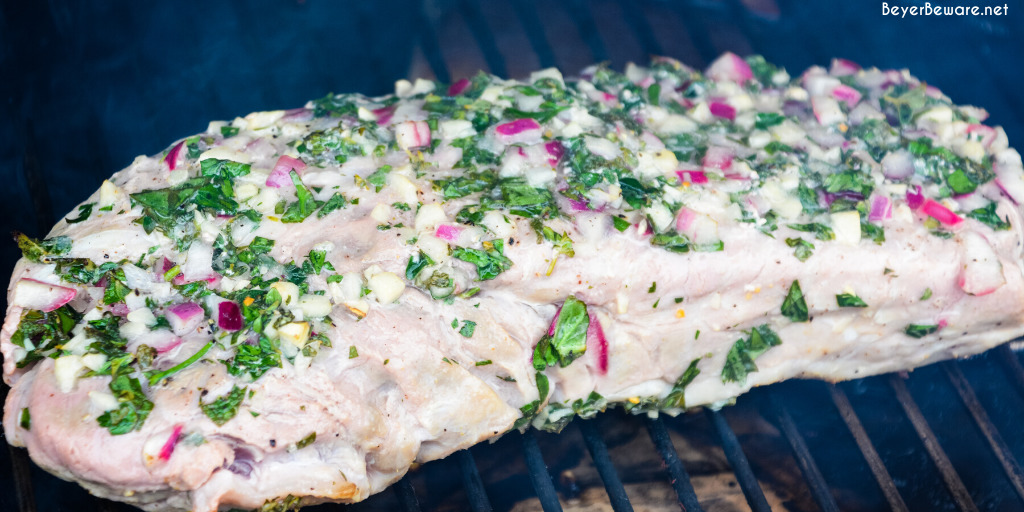 Garlic and Herb Crusted Grilled Pork Loin uses fresh herbs, garlic, and onions with simple wine, lemon juice, and oil marinade then grilled to juicy pork loin perfection. 