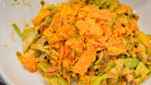 Make the best taco salad with seasoned ground beef, ranch and taco seasoning, and a delicious mix of ranch and Western dressing. This easy taco salad recipe is perfect for quick dinners and potlucks!