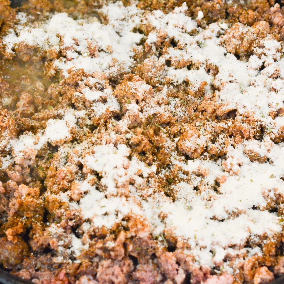 In a large skillet over medium heat, brown the ground beef. Drain the fat, then stir in the taco seasoning and ranch seasoning with ¼ cup water. 