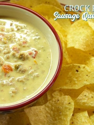 Crock Pot Sausage Queso dip easy 3-ingredient cheesy sausage Rotel Velveeta dip that you can have ready in two hours in the crockpot.