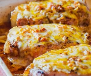 Cheesy garlic and brown sugar pork chops are a simple pork chops recipe cooked in the oven in under 30 minutes for an easy weeknight meal. The only thing that may have made these cheesy garlic and brown sugar pork chops better is a splash of bourbon.