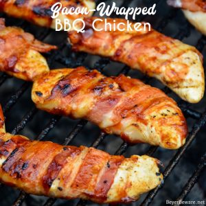 Grilled bacon-wrapped BBQ chicken recipe is lightly seasoned chicken tenderloins that are then wrapped in bacon and then coated in a doctored up barbeque sauce before quickly grilling to perfection.