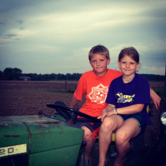 Kids sitting on a tractor