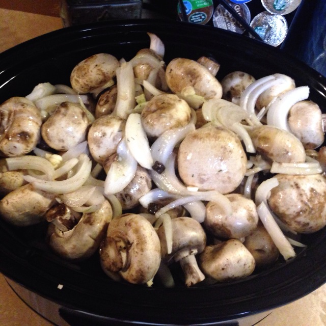 Mushrooms and onions in red wine and butter slow cooks for 12 hours.