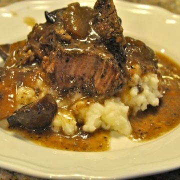 Slow Cooked beef roast and mushrooms in red wine