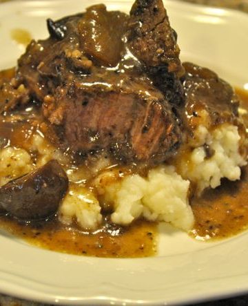 Slow Cooked beef roast and mushrooms in red wine