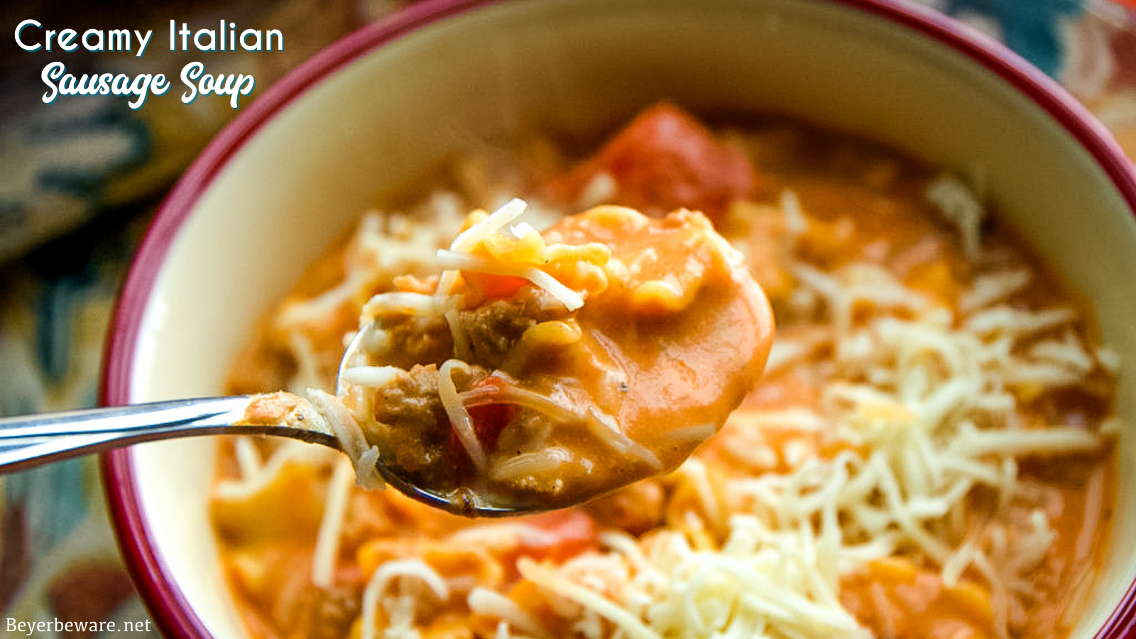 Creamy Italian Sausage Soup recipe is my new go-to tomato and sausage soup recipe that is rich and hearty, perfect for an easy dinner.