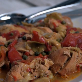 This crock pot Italian chicken recipe is full of flavor with the artichokes, roasted red peppers, capers and of course white wine.