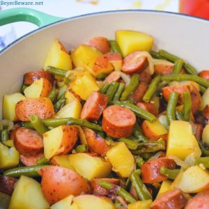 Hoosier Stew is Indiana comfort food with fresh green beans, red potatoes, and smoked sausage that has simmered in caramelized onions and garlic for an easy dinner recipe.