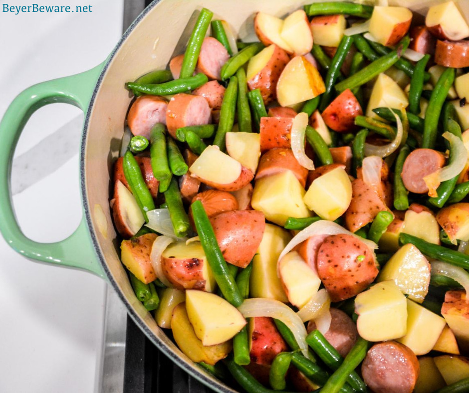 Hoosier Stew is Indiana comfort food with fresh green beans, red potatoes, and smoked sausage that has simmered in caramelized onions and garlic for an easy dinner recipe.