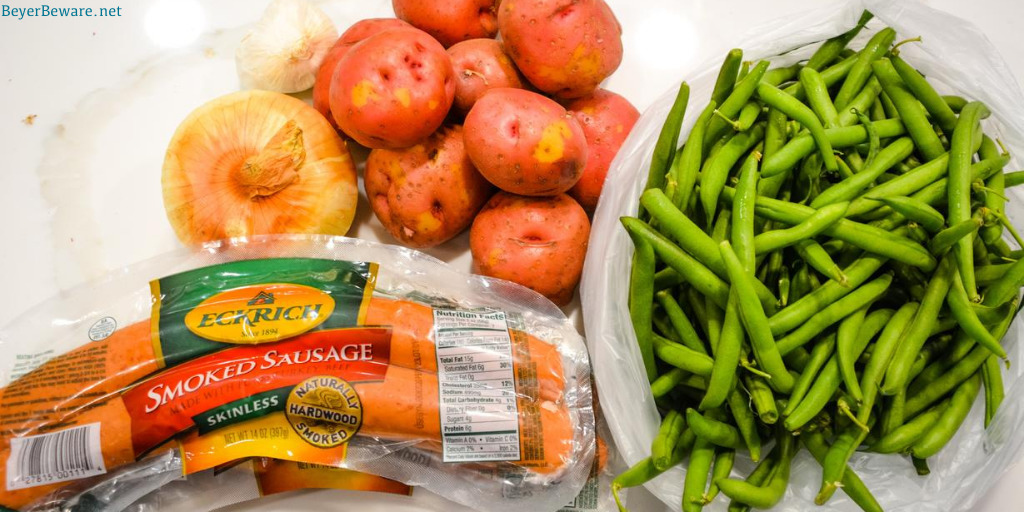 Hoosier Stew Ingredients of smoked sausage, green beans, potatoes, onions, and garlic