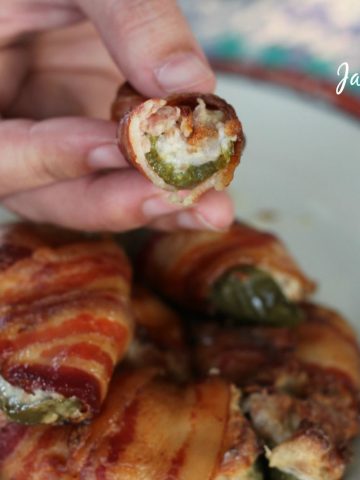 These bacon wrapped jalapeno poppers have 5 ingredients and sure to be a hit at your next tailgate or party.