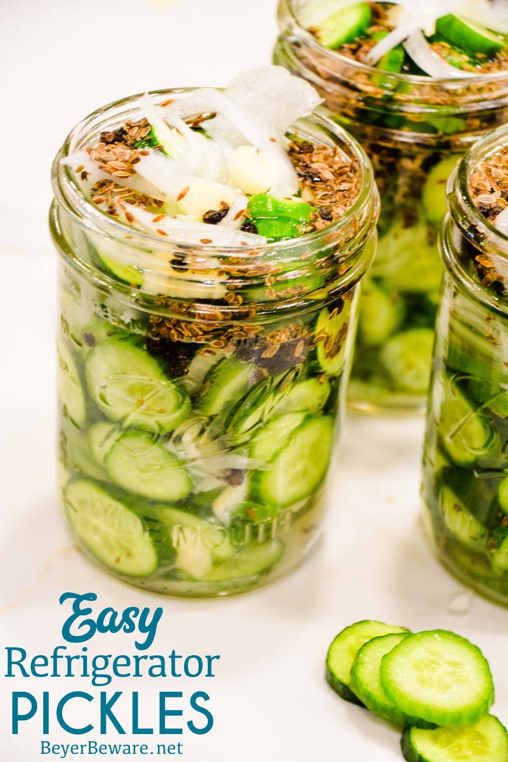 These easy refrigerator dill pickles are quick to make refrigerator pickle recipe made with cucumbers, onions, garlic, and lots of seasonings for the ultimate homemade pickles.