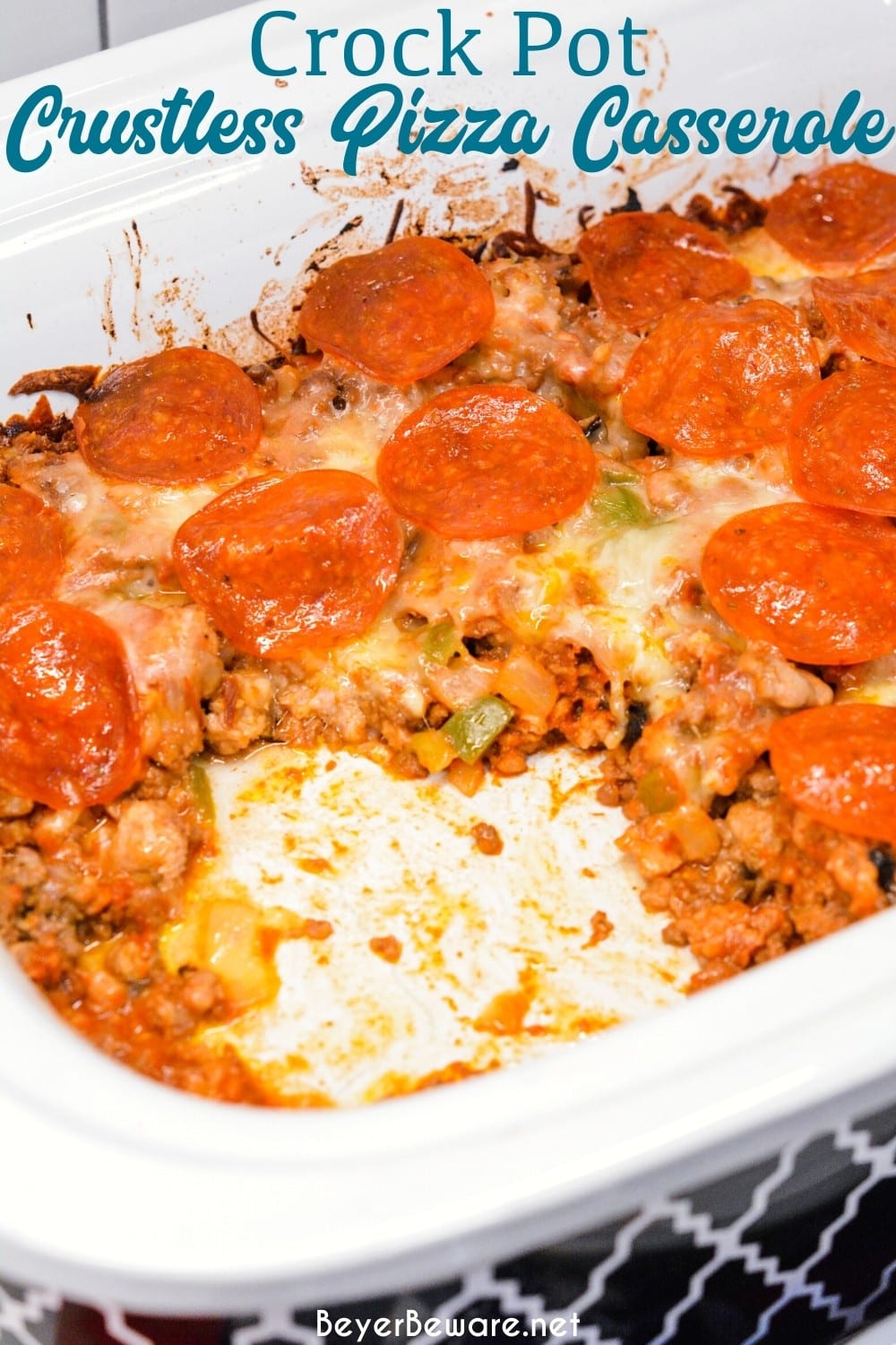 This low carb crock pot pizza casserole is a new favorite pizza recipe even for the folks not eating low-carb since it is full of a lot of meat, cheese, and flavor no one misses the crust or pasta in this crustless pizza casserole.