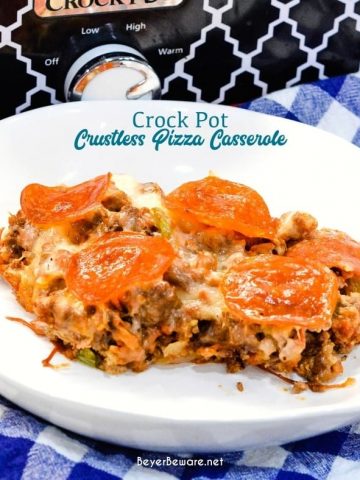 This low carb crock pot pizza casserole is a new favorite pizza recipe even for the folks not eating low-carb since it is full of a lot of meat, cheese, and flavor no one misses the crust or pasta in this crustless pizza casserole.