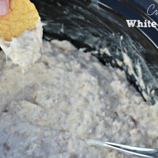 Crock Pot White Pizza Dip recipe is a great alternative to the traditional sausage queso dip. Brings all the flavors from pizza on the end of chip.