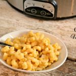 A creamy crock pot mac and cheese recipe that can be ready in two hours and let's you fix it and forget it on a busy night.
