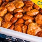 Crock Pot Monkey Bread uses refrigerator Grands biscuits with sugar and cinnamon to create a warm and gooey sticky pull-apart bread.