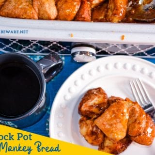 Crock Pot Monkey Bread uses refrigerator Grands biscuits with sugar and cinnamon to create a warm and gooey sticky pull-apart bread.