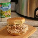 A simple crock pot creamy chicken bacon ranch recipe that is the perfect shredded chicken sandwich.