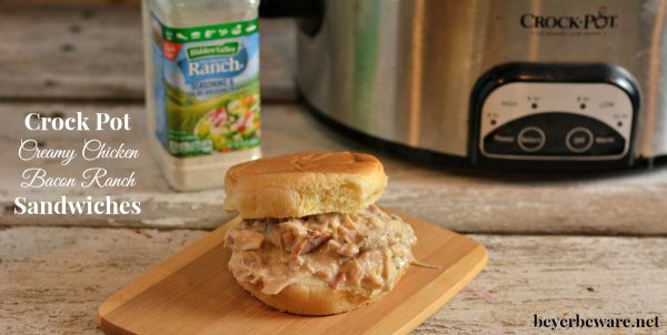 A simple crock pot creamy chicken bacon ranch recipe that is the perfect shredded chicken sandwich.