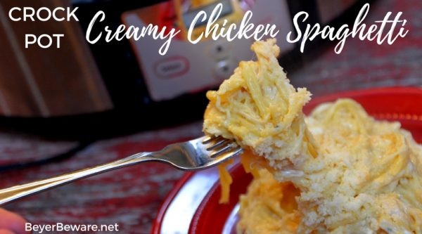 Crock pot creamy chicken spaghetti is the perfect chicken pasta dish with cream cheese and Italian seasoning to give the dish great alfredo flavors when you are needing to feed a large crowd or a hungry family.