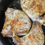 Flourless Pan-Fried pork chops recipe has no flour, no marinading, no waiting, just juicy, flavorful pork chops cooked in a buttered cast iron skillet.