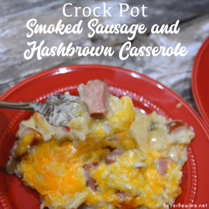 Crockpot smoked sausage and hashbrown casserole is a simple cheesy sausage and potato recipe made with frozen hash browns, sour cream, onions, cream of mushroom soup, smoked sausage, and shredded cheese that is a great weeknight meal in my beloved casserole crock pot.