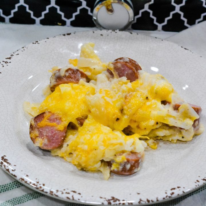 If you love funeral potatoes or hash brown casserole, you will love this casserole crock pot recipe that is filled with smoked sausage and hash brown casserole.