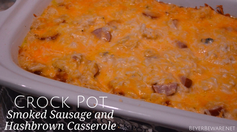 Crock pot smoked sausage and hashbrown casserole is a simple cheesy sausage and potato recipe that is a great weeknight meal in my beloved casserole crock pot.