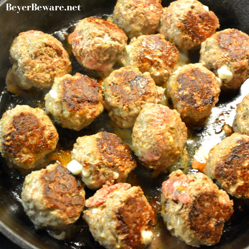 These mozzarella stuffed meatballs are a must make. Tonight. These can be a low-carb and gluten free meal or served as spaghetti and meatballs.