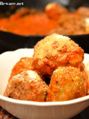 These mozzarella stuffed meatballs are a must make. Tonight. These can be a low-carb and gluten free meal or served as spaghetti and meatballs.