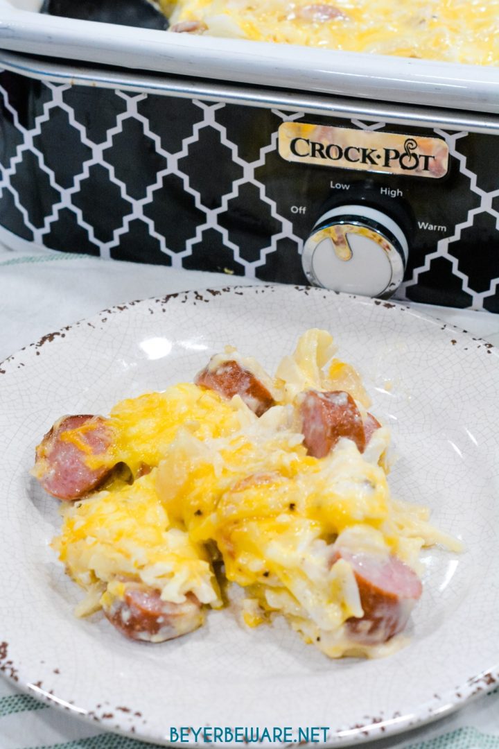 If you love funeral potatoes or hash brown casserole, you will love this casserole crock pot recipe that is filled with smoked sausage and hash brown casserole.