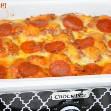 After three hours this crock pot bubble up pizza casserole was a cheesy goodness filled with our favorite pizza toppings. It is the perfect way to make a weeknight meal when you can't be home to put the casserole in the oven.