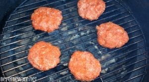 The Cajun pork burgers topped with shrimp and then drenched in a Cajun aioli combine ground pork, chorizo, with a Cajun seasoned horseradish mayonnaise for a perfect surf and turf burger recipe.