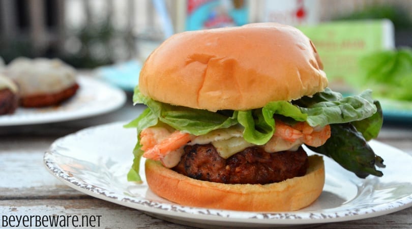 The CajunÂ pork burgers topped with shrimp and then drenched in a Cajun aioli combine ground pork, chorizo, with a Cajun seasoned horseradish mayonnaise for a perfect surf and turf burger recipe.