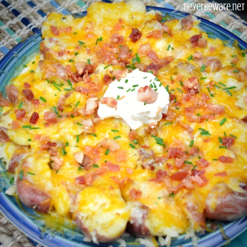 Quick cheesy potatoes are an easy loaded cheesy potatoes recipe with all of your loaded baked potato toppings that can be done in under 20 minutes.