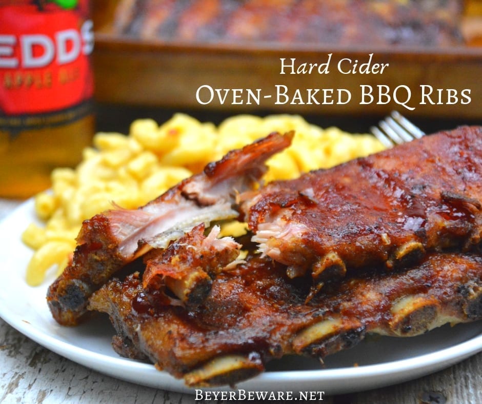 Hard cider oven-baked BBQ ribs are an easy combination of dry rub, hard cider, and barbecue sauce where the flavors meld together after hours of slow roasting.