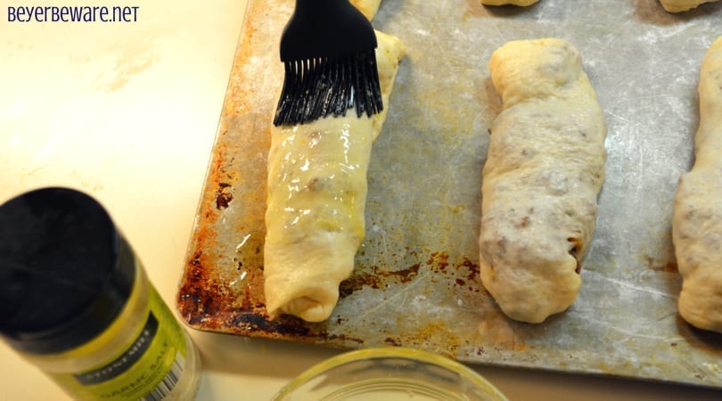 These sloppy joe sticks are handheld sloppy joes that meld meat and cheese together inside a burrito made from pizza crust.