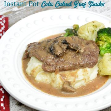 Instant Pot Coca-Cola Cubed Beef Steaks is a simple recipe made quickly with the dump of cubed steaks, a Coke, onion soup mix and cream of mushroom soup in the Instant Pot.